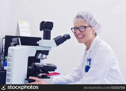 group of scientists working at the laboratory