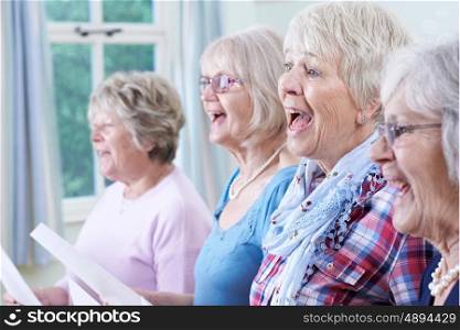 Group Of Senior Women Singing In Choir Together