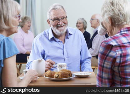 Group Of Seniors Meeting At Social Club