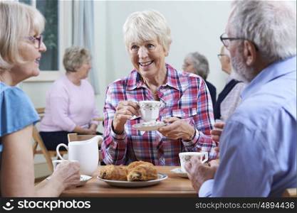 Group Of Seniors Meeting At Social Club