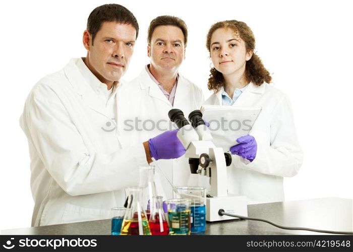 Group of serious scientists in the laboratory. Isolated on white.