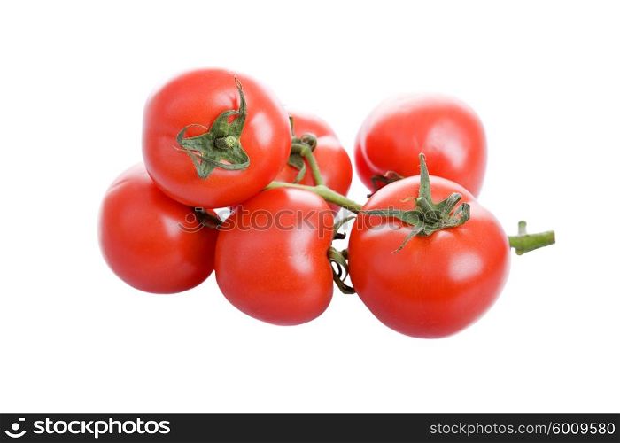 group of six red fresh tomatoes, isolaetd on white