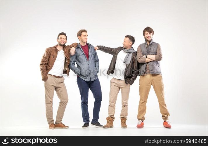 Group of smart guys advertising clothes