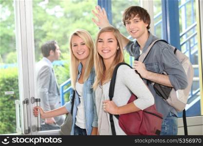 Group of students at college entrance
