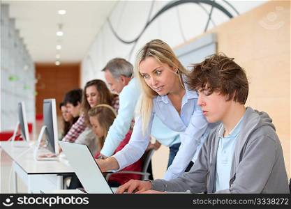 Group of students attending training course at school