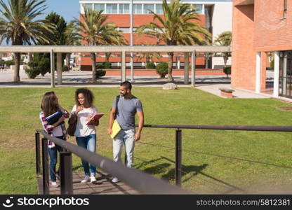 Group of students sitting on school campus