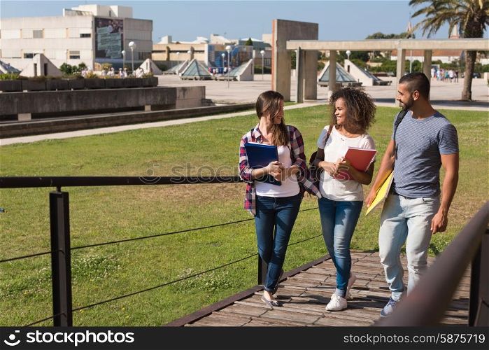 Group of students walking on school campus