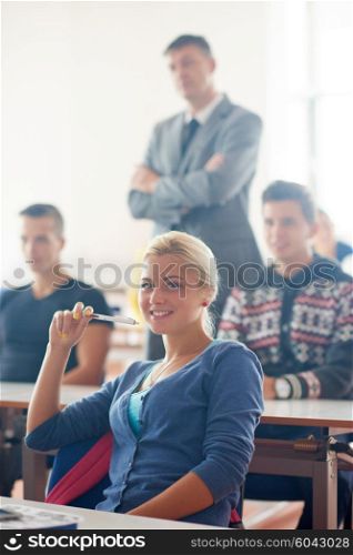 group of students with teacher on class learning lessons