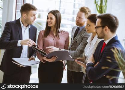 Group of successful business people standing in the office