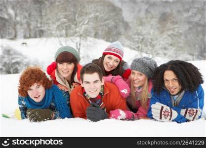 Group Of Teenage Friends Having Fun In Snowy Landscape