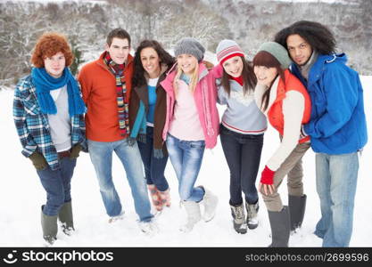 Group Of Teenage Friends Having Fun In Snowy Landscape