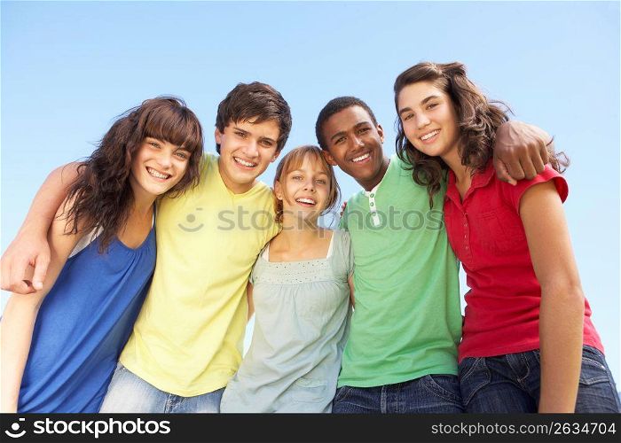 Group Of Teenage Friends Standing Outside