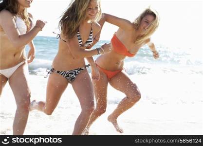 Group Of Teenage Girls Enjoying Beach Holiday Together