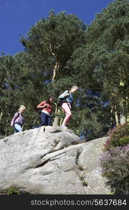 Group Of Teenage Girls Hiking In Countryside