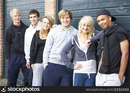 Group Of Teenagers Hanging Out Together Outside