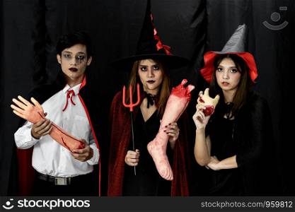 Group of teenages and young adult in Halloween costume for Halloween party background