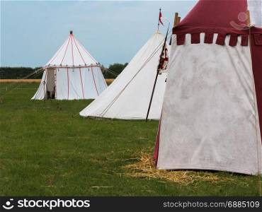 Group of Tents on Meadow set up for Medieval Event Reconstruction