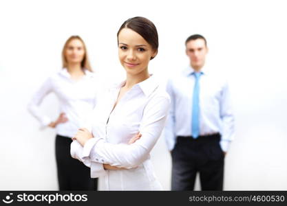 Group of three successful young business persons together