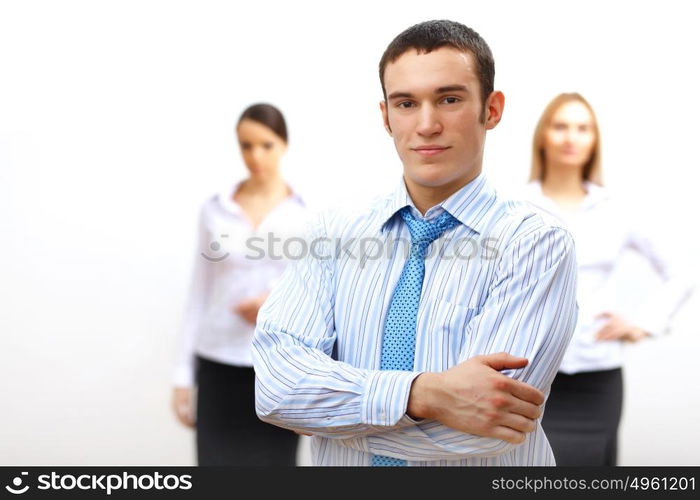 Group of three successful young business persons together