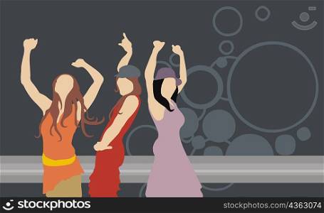 Group of three women dancing in a nightclub