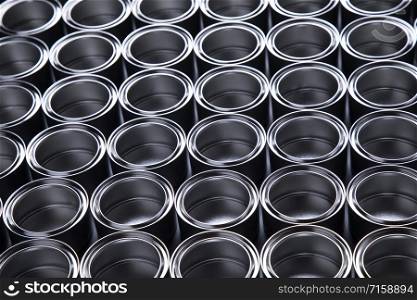 Group of tin metal cans with color paint