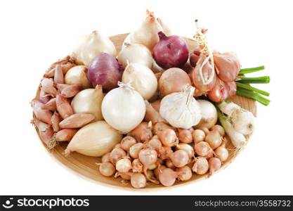 group of varieties onions in a wood dish