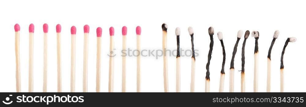 group of whole pink matches and burnt matches (isolated on a white background)