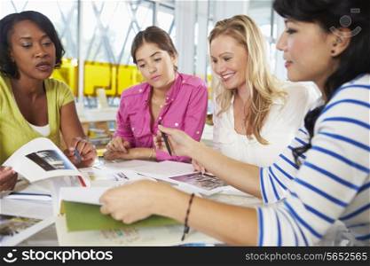 Group Of Women Meeting In Creative Office