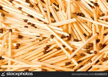 Group of wooden matches arranged as background