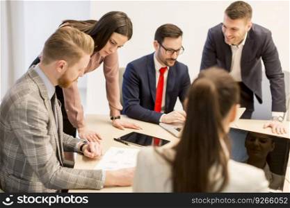 Group of young business people work in a team in a modern office