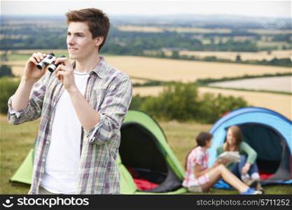 Group Of Young Friends Camping In Countryside
