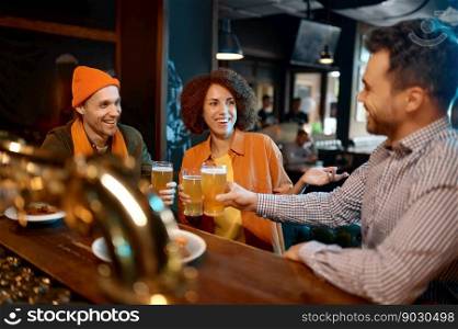 Group of young friends celebrating success, sharing emotions while rest at sports bar. Millennial diverse people drinking beer and toasting for win. Group of young friends celebrating success while rest at sports bar