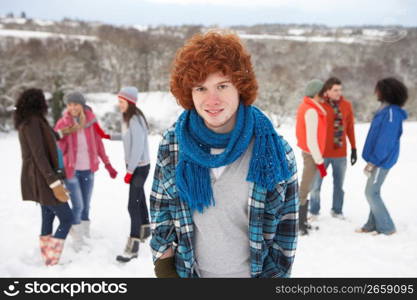 Group Of Young Friends Having Fun In Snowy Landscape