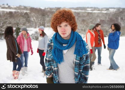 Group Of Young Friends Having Fun In Snowy Landscape