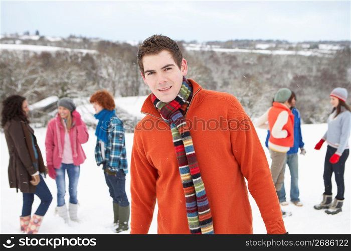 Group Of Young Friends Having Fun In Snowy Landscape