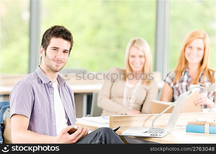 Group of young high school students learning relaxing with books