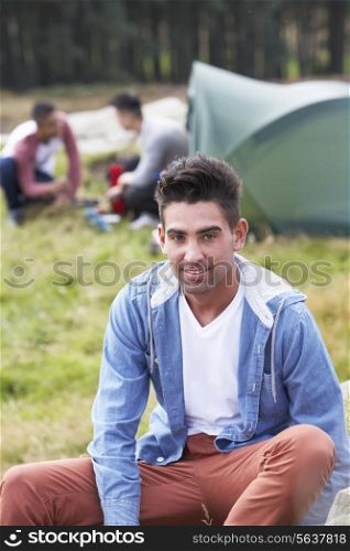 Group Of Young Men On Camping Trip In Countryside