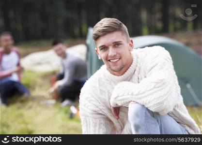 Group Of Young Men On Camping Trip In Countryside