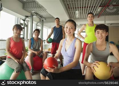 Group of young people in the gym, portrait