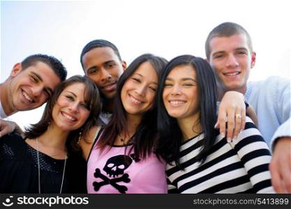 group of young people posing for photo