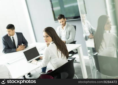 Group of young people working in the modern office