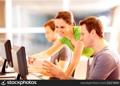 Group of young people working on computer