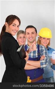 Group of young workers on white background