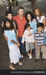 Group portrait of family in urban setting, Los Angeles, California