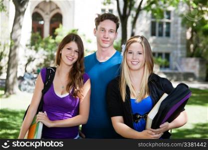 Group portrait of three college students