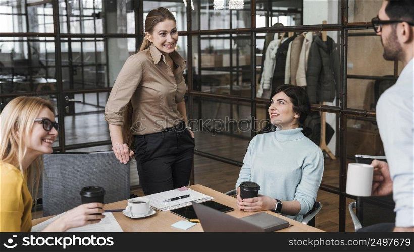group young businesspeople during meeting indoors