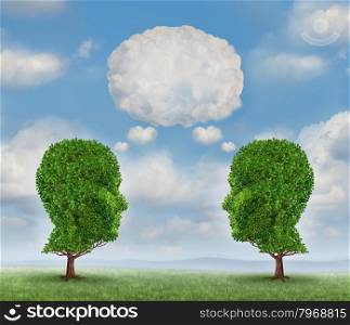 Growing network communication with a group of two trees shaped as a human head with a blank word bubble made of clouds as a business concept of team growth sending a message with cloud technology.