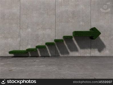 Growth and progress concept. Concrete room with green graph stair on wall going up