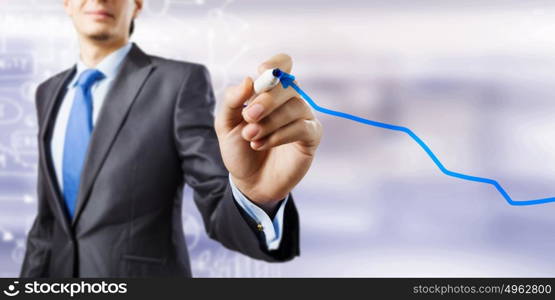 Growth concept. Close up of businessman drawing increasing graph with marker