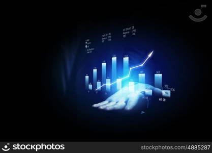 Growth concept. Close up of businesswoman hand presenting digital charts